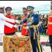President John Dramani Mahama [right], presenting the award to Junior Under Officer, Alex Kojo Abayateye [left].