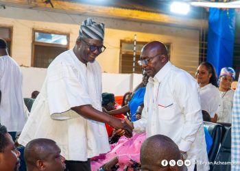 Bryan shaking Dr Bawumia at the party headquarters