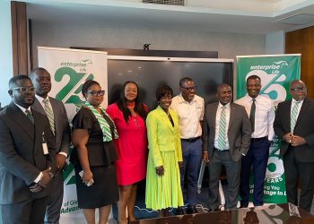 Officials of Enterprise Life Assurance Ltd, with Figtech Limited managers.