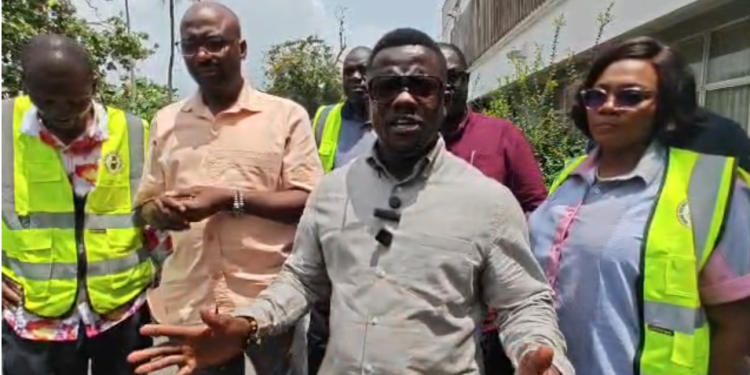 Chief Executive Officer of the Ghana Railway Development Authority, Dr. Frederick Appoh [in ash].