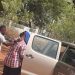 The suspect with coloured shirt