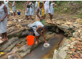 Students of Taviefe Senior High School in the Ho Municipality fetching water from a borehole.