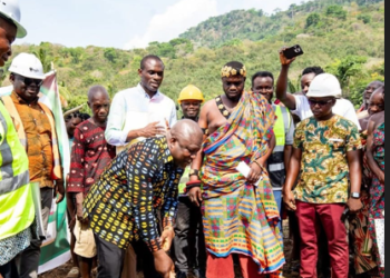 James Gunu, Volta regional minister, cutting the sod for the earmarked projects.