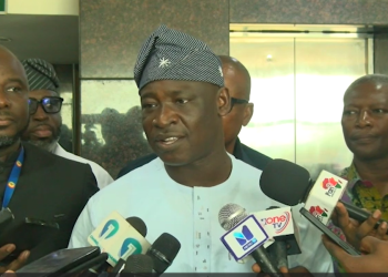 Chairman of Parliament’s Information and Communications Committee, Abednego Bandim [in white].