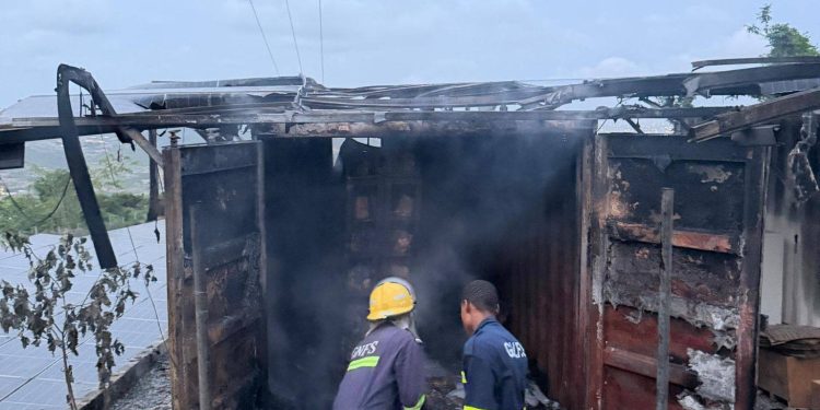 Emergency responders extinguishing container housing solar inverter batteries