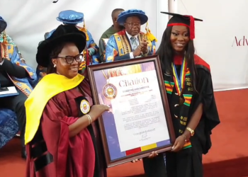 Graduate Andowa Ama Buabeng (right) receiving a citation