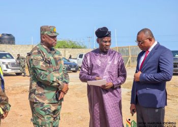 Education Minister, Haruna Iddrisu [middle], Defence Minister, Brogya Genfi.