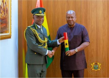 Comptroller-General of Immigration Samuel Basintale Amadu with President John Dramani Mahama