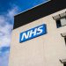 Warrington, United Kingdom - March 6, 2016: Warrington, UK - march 6, 2016: View of the NHS (National Health Service) logo at the Springfields Medical Centre in the centre of Warrington, Cheshire.