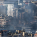 Smoke rises after an Israeli strike on Beirut's southern suburbs, following an escalation between Hezbollah and Israel amid the U.S.-Israeli conflict with Iran, Lebanon, March 5, 2026. REUTERS/Claudia Greco Purchase Licensing Rights