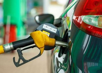File Image of a vehicle being refilled at a fuel station