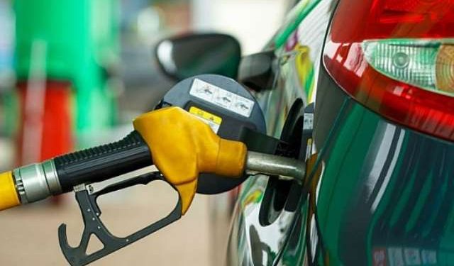 File Image of a vehicle being refilled at a fuel station