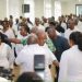 Photograph of President John Dramani Mahama hugging Chief of Staff Julius Debrah
