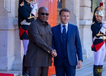 President John Dramani Mahama (L), French President Emmanuel Macron  (R)