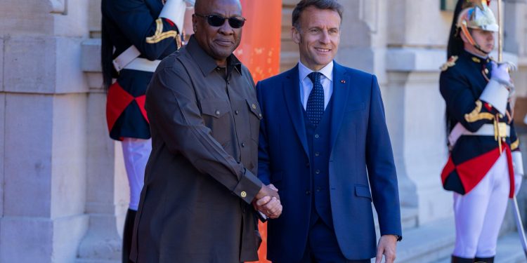 President John Dramani Mahama (L), French President Emmanuel Macron  (R)