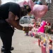 A memorial has been growing at the scene of the shooting in Williamsburg. Photo Credit: Getty Images