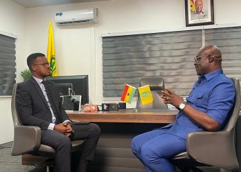 Mohammed Abdul-Salam, Director General, National Lottery Authority [right] with Umaru Sanda Amadu, host of Face to Face [left]