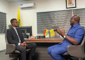 Mohammed Abdul-Salam, Director-General of the National Lottery Authority [right], with Host of Face to Face, Umaru Sanda Amadu