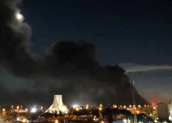Smoke rises over Azadi Square following a strike, amid the U.S.-Israeli conflict with Iran, in Tehran, Iran, April 6, 2026, in this screengrab obtained from a social media video. Social Media via REUTERS Purchase Licensing Rights