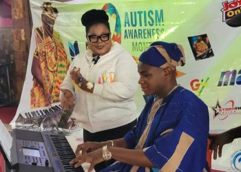 Autistic advocate Young Phil Bertino [in blue]