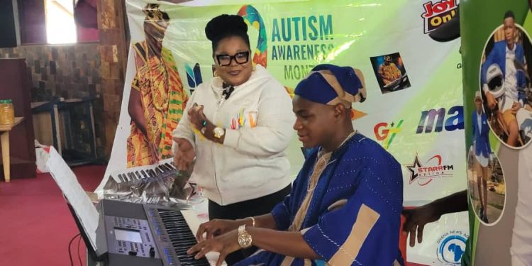 Autistic advocate Young Phil Bertino [in blue]