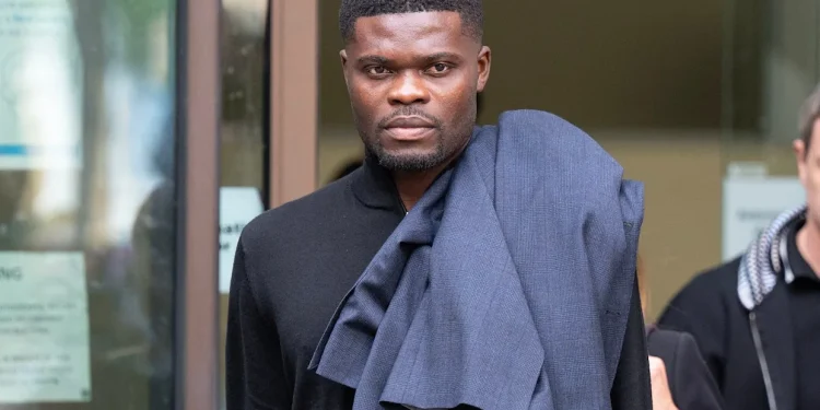 Former Arsenal footballer Thomas Partey arrives at London's Westminster Magistrates' Court where he is charged with five counts of rape and one count of sexual assault, in London, Tuesday, Aug. 5, 2025. Credit: AP/Yui Mok