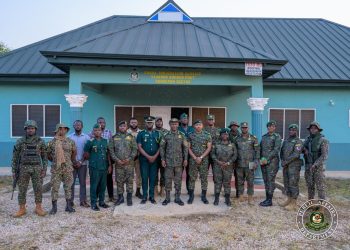 Comptroller-General of Immigration, Samuel Basintale Amadu with other immigration officials