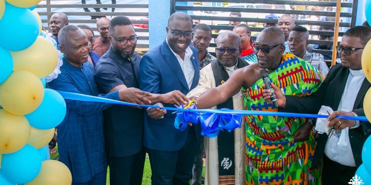 Member of Parliament for Akuapem North, Samuel Awuku(in suit)
