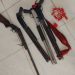 Pump-action guns and single-barrel gun retrieved from the scene