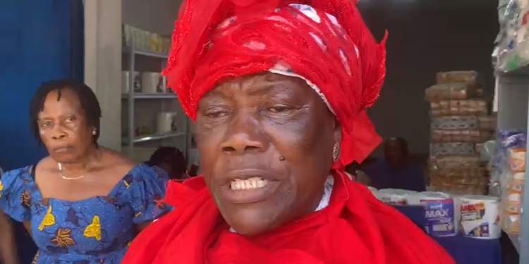 A trader at the 31st December Makola Market