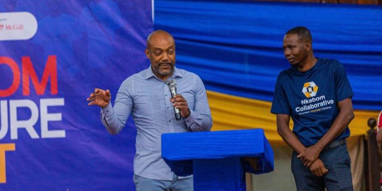 Director of the Secretariat of the Nkabom Collaborative, Pierre Brunache Jr (Speaking)