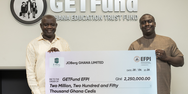 Chief Executive Officer of
JOBerg GH Ltd , Mr Joseph Magnus Marteye(right) presenting cheque to GETFUND