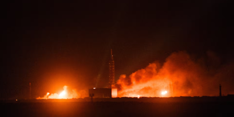 Fire and smoke rise from the launch pad of Blue Origin's New Glenn rocket as it explodes during a test, in Cape Canaveral, Florida, U.S., May 28, 2026, in this picture obtained from social media. Courtney Blair/via REUTERS Purchase Licensing Rights
