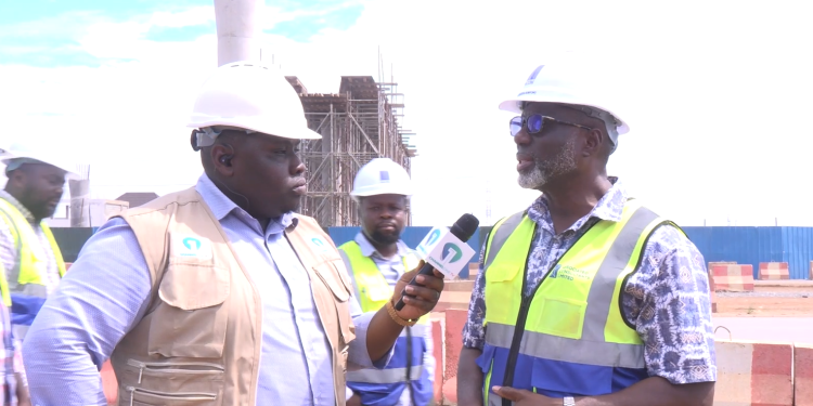Accra-Tema Motorway project Chief Resident Engineer, Ing. Kwabena Bempong [right]