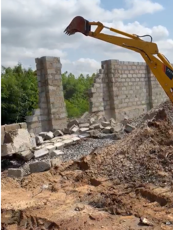Ablekuma West Assembly demolishes wall blocking waterway at Opetekwe
