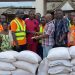 Member of Parliament for Abura-Asebu-Kwamankese, Felix Ofosu Kwakye donating items and cash to the victims