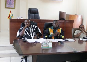 Hon Israel Adjetey Otchwenmah, MCE for Ledzokuku in smock