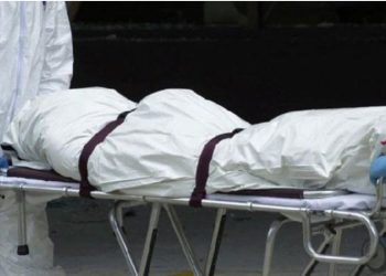 A file photo of dead body being carried by health officials