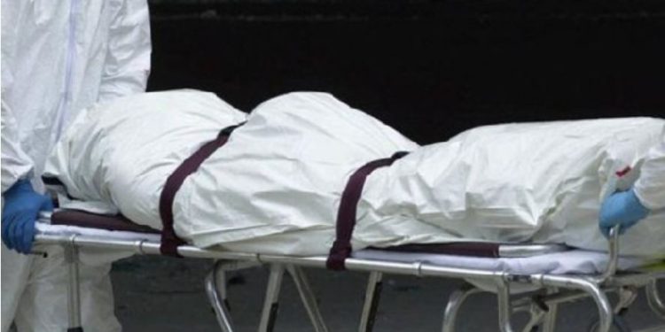 A file photo of dead body being carried by health officials