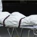 A file photo of dead body being carried by health officials