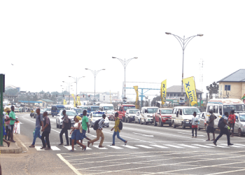 File image of pedestrian crossing the road