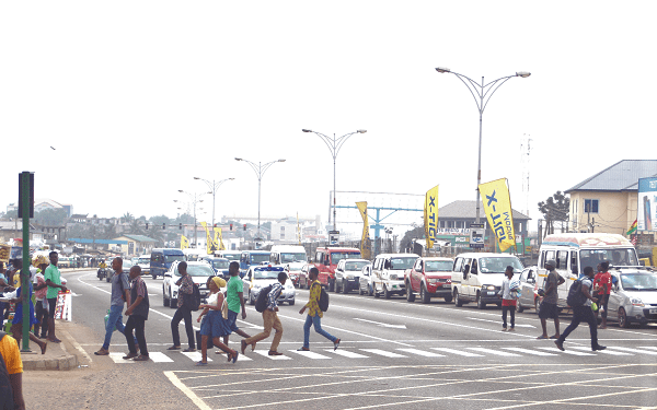 File image of pedestrian crossing the road