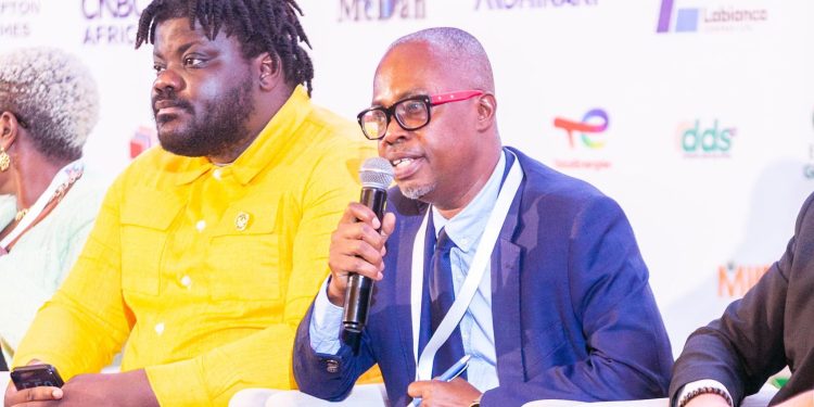 Managing Director of Telecel Cash, Philip Amoateng, speaks on a high-level panel at the 10th Ghana CEO Summit.