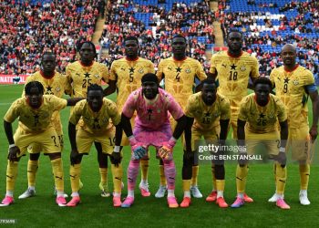 Ghana's goalkeeper #01 Lawrence Ati-Zigi (C) poses with teammates ahead of the international friendly football match between Wales and Ghana ahead of the 2026 FIFA World Cup football tournament, at Cardiff City Stadium, in Cardiff, on June 2, 2026. (Photo by Ben STANSALL / AFP via Getty Images)