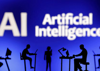 Figurines with computers and smartphones are seen in front of the words "Artificial Intelligence AI" in this illustration taken, February 19, 2024. REUTERS/Dado Ruvic/Illustration/File Photo Purchase Licensing Rights