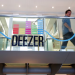 An employee passes by a logo at the music streaming services Deezer's headquarters in Paris, France, September 5, 2017. Picture taken September 5, 2017. REUTERS/Charles Platiau Purchase Licensing Rights