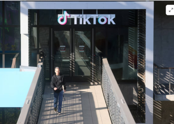 A man leaves the U.S. headquarters of the social media company TikTok in Culver City, California, U.S. January 17, 2025. REUTERS/David Swanson/File Photo Purchase Licensing Rights