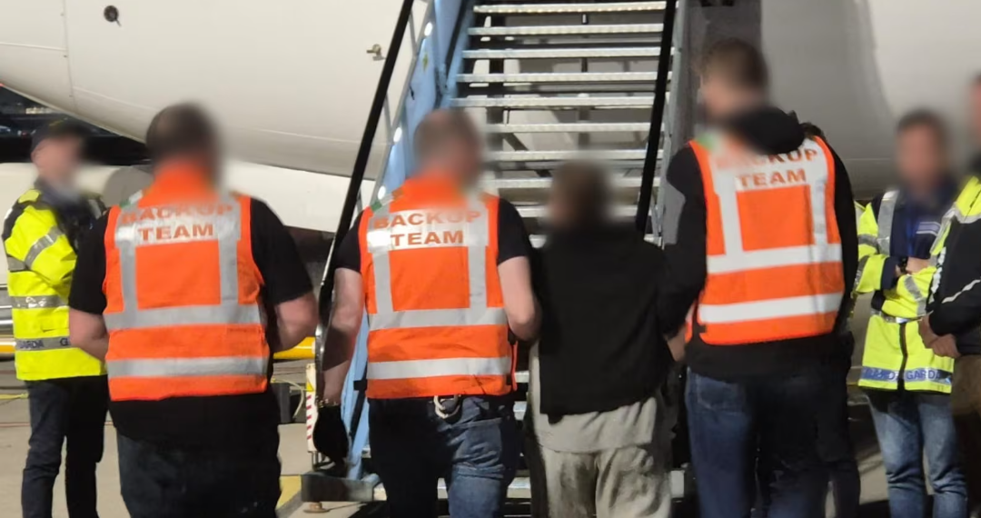 A deportation operation at Dublin Airport last year. The latest of four such operations took place on Thursday, when 42 people were deported to South Africa. Photograph: An Garda Síochána