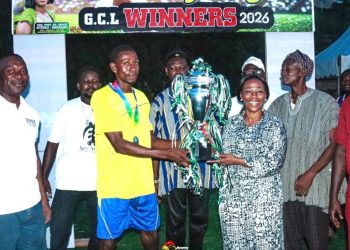 Dr. Grace Ayensu-Danquah, Member of Parliament for Essikado-Ketan, presents the championship trophy to the winning team of the 2026 Dr. Grace Community League.