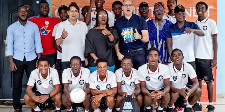 QNET and Samuel Inkoom Football Academy officials